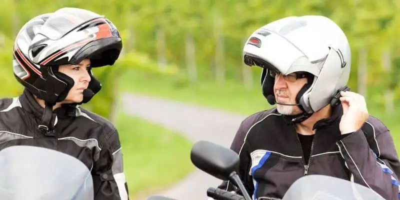 Two motorcycle riders using a motorcycle communication system