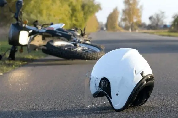 Motorcycle and helmet on the road