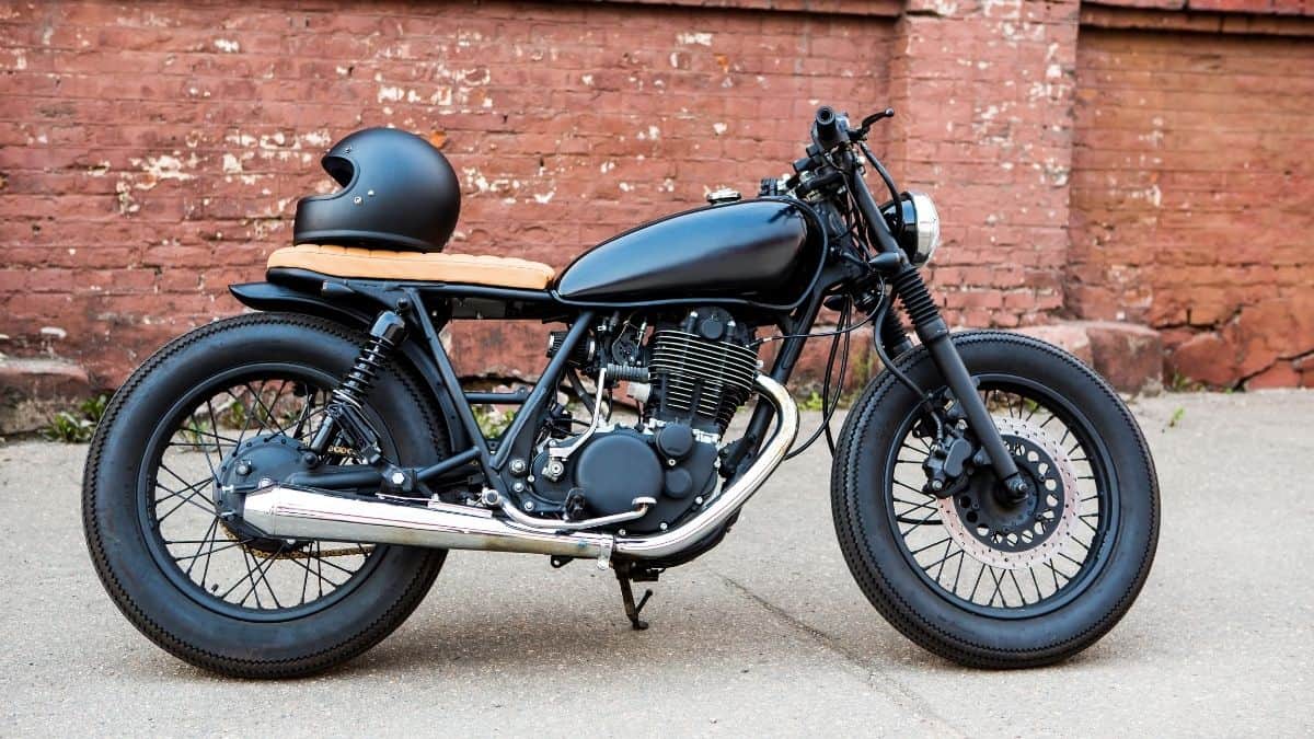 Cafe racer with shiny chrome exhaust system