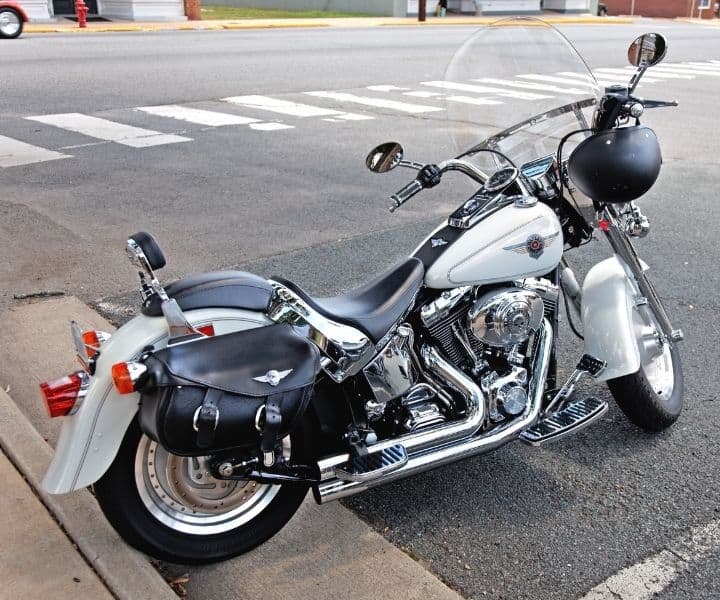 Harley Davidson with shiny long chrome exhaust pipes