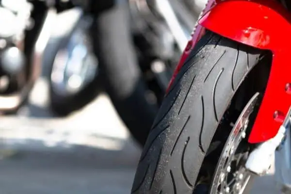 Front Tire Of A Red Motorcycle