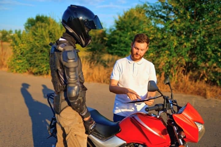 Man Is Learning How To Ride A Motorcycle