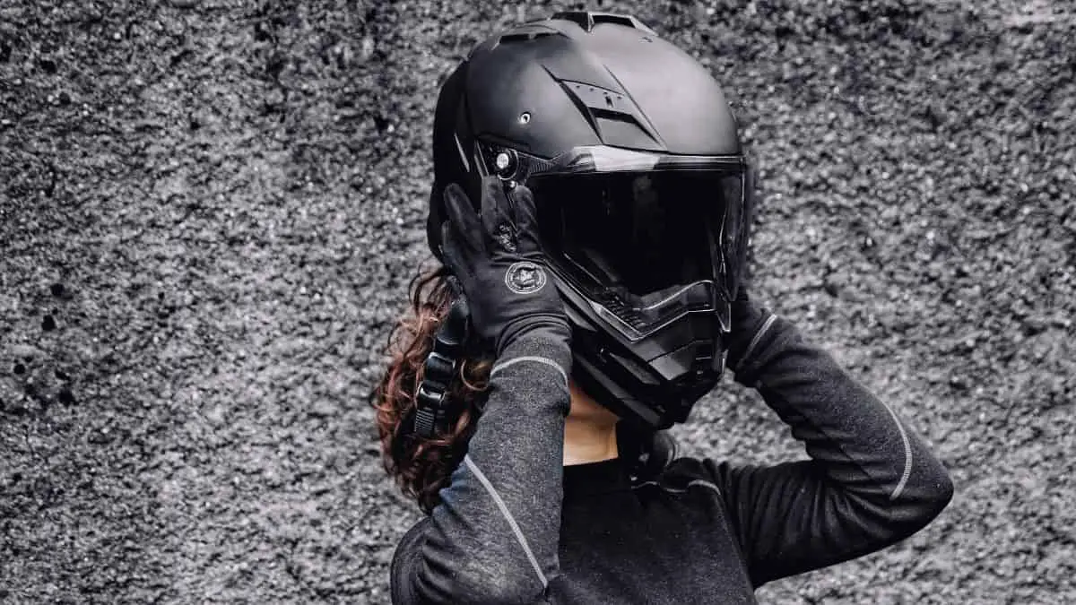Woman Rider Taking Off Her Motorcycle Helmet