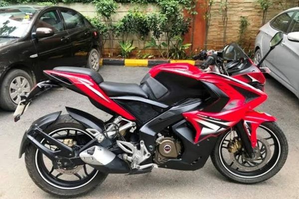 Red And Black Bajaj Pulsar Motorcycle
