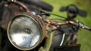 Headlight Of A Rusty Old Motorcycle